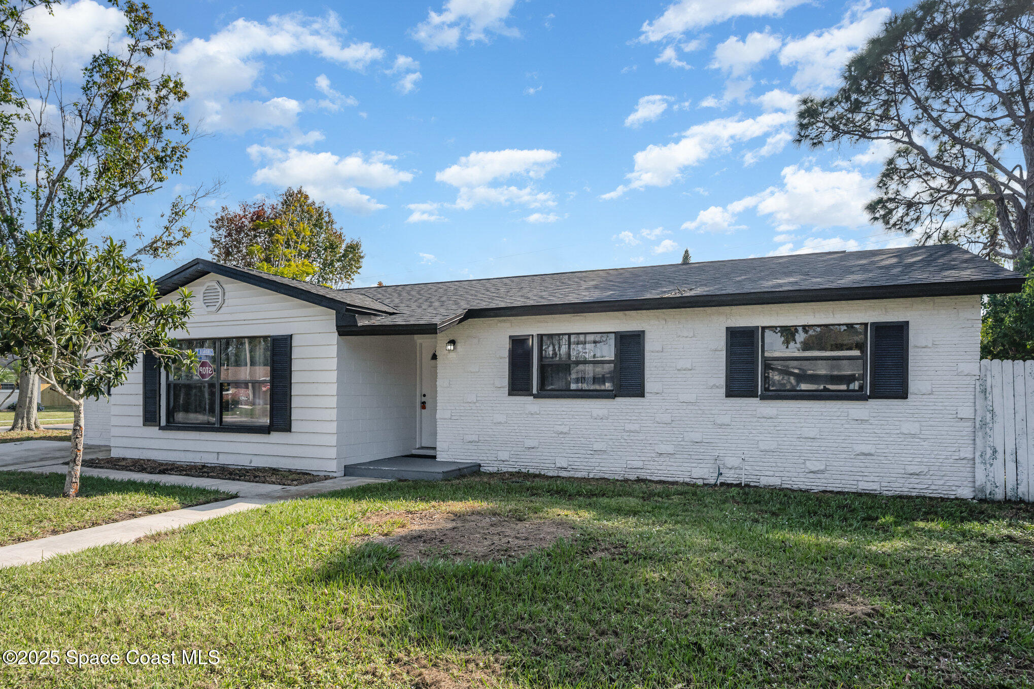 1121 Coronado Drive Rockledge, FL 32955 - Photo 3 of 25 a front view of house with yard and garage