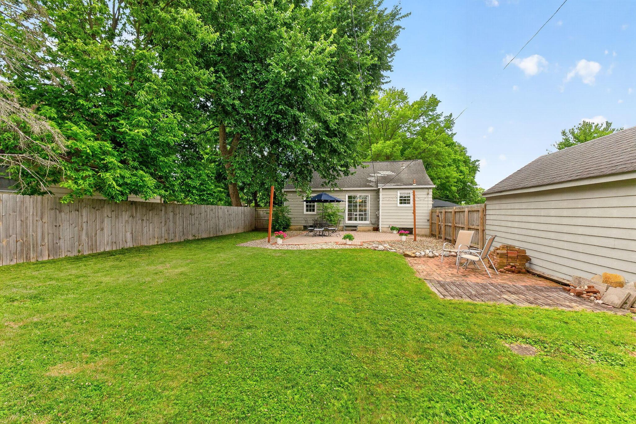 492 Wetmore Road Columbus, OH 43214 - Photo 41 of 55 Expansive green lawn with a full privacy fence