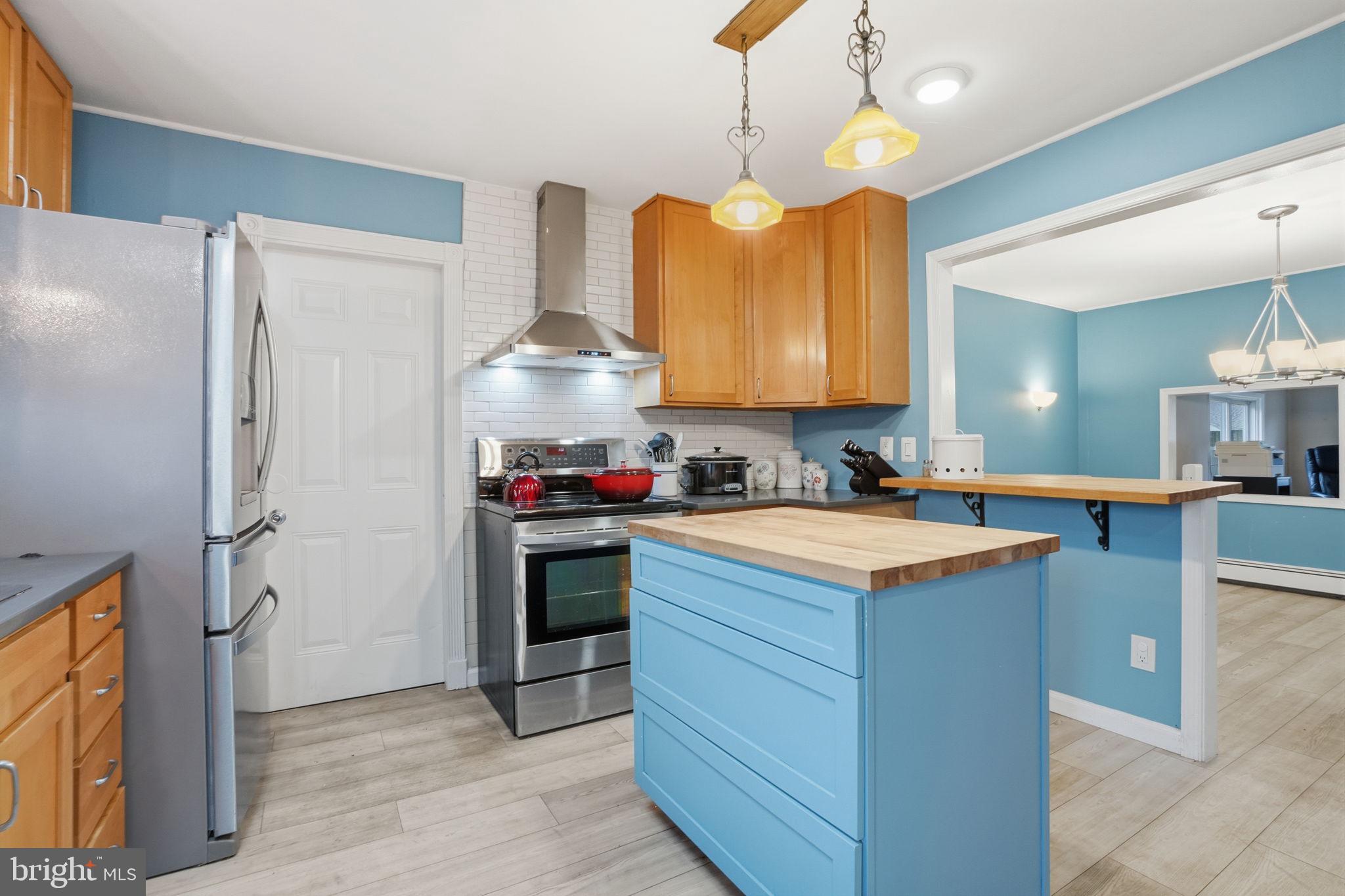 80 Silverspruce Road Levittown, PA 19056 - Photo 11 of 31 a kitchen with granite countertop a sink a counter space appliances and cabinets