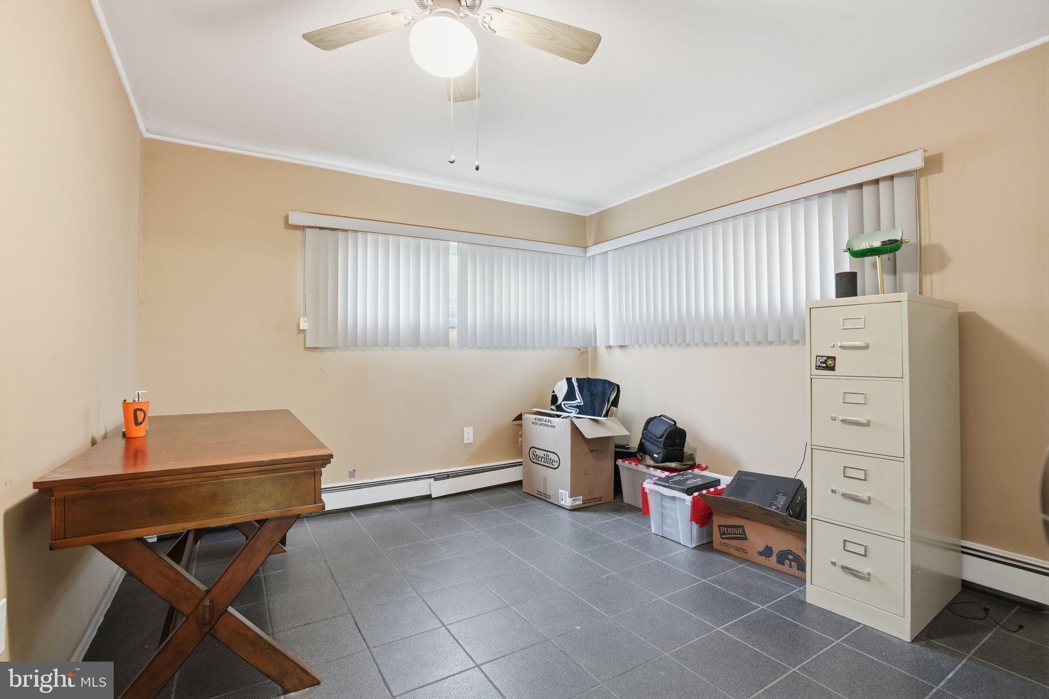 80 Silverspruce Road Levittown, PA 19056 - Photo 20 of 31 a living room with furniture and a window
