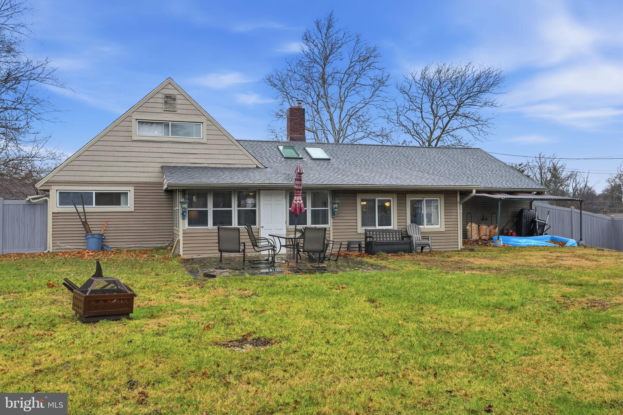 80 Silverspruce Road Levittown, PA 19056 - Photo 28 of 31 a front view of house with a garden and patio