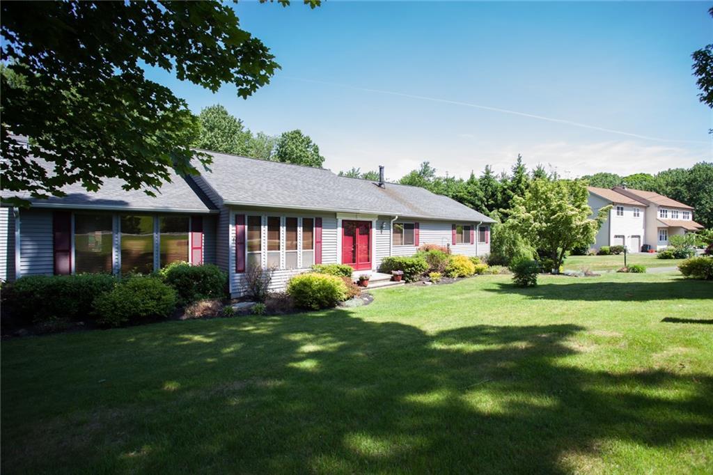 22 Brighton Road Prospect, CT 06712 - Photo 1 of 1 a front view of house with yard and green space