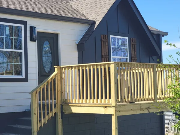 a view of a house with a deck