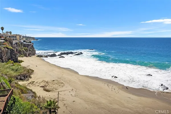 a view of ocean beach with beach