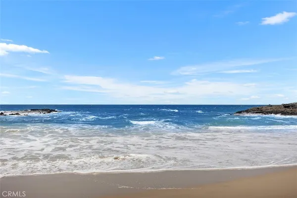 a front view of building with a garden
