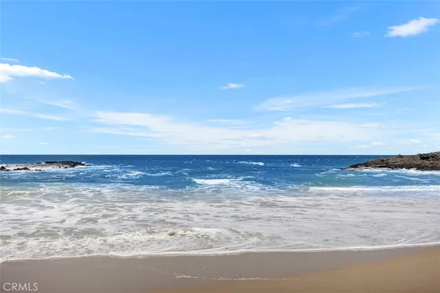 a front view of building with a garden