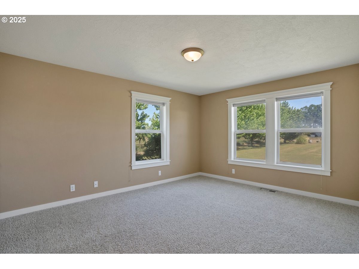 17780 Southeast Wallace Road Dayton, OR 97114 - Photo 16 of 26 a view of an empty room with a window