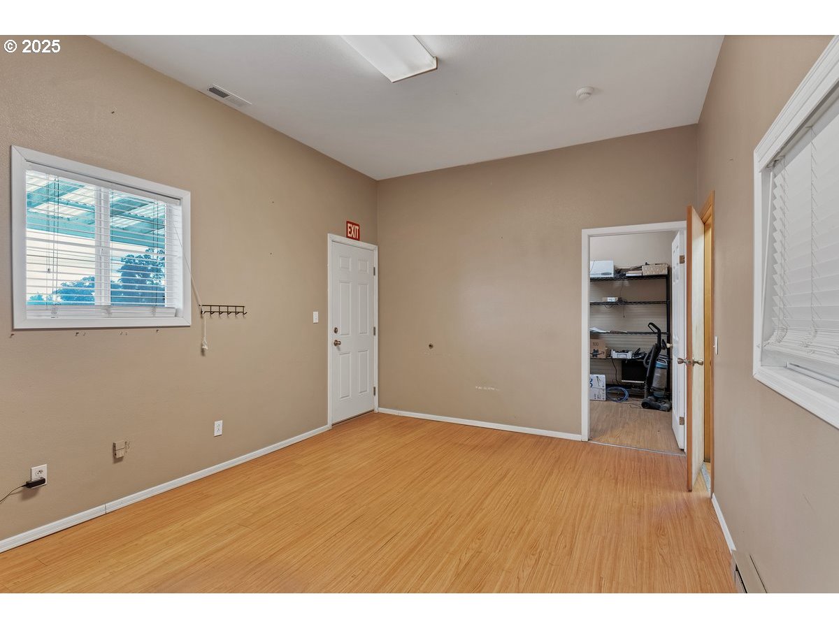 17780 Southeast Wallace Road Dayton, OR 97114 - Photo 19 of 26 a view of an empty room with closet and a window