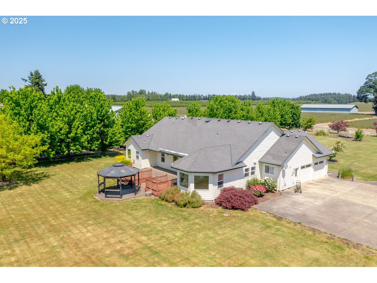 17780 Southeast Wallace Road Dayton, OR 97114 - Photo 2 of 26 a aerial view of a house with swimming pool and a yard