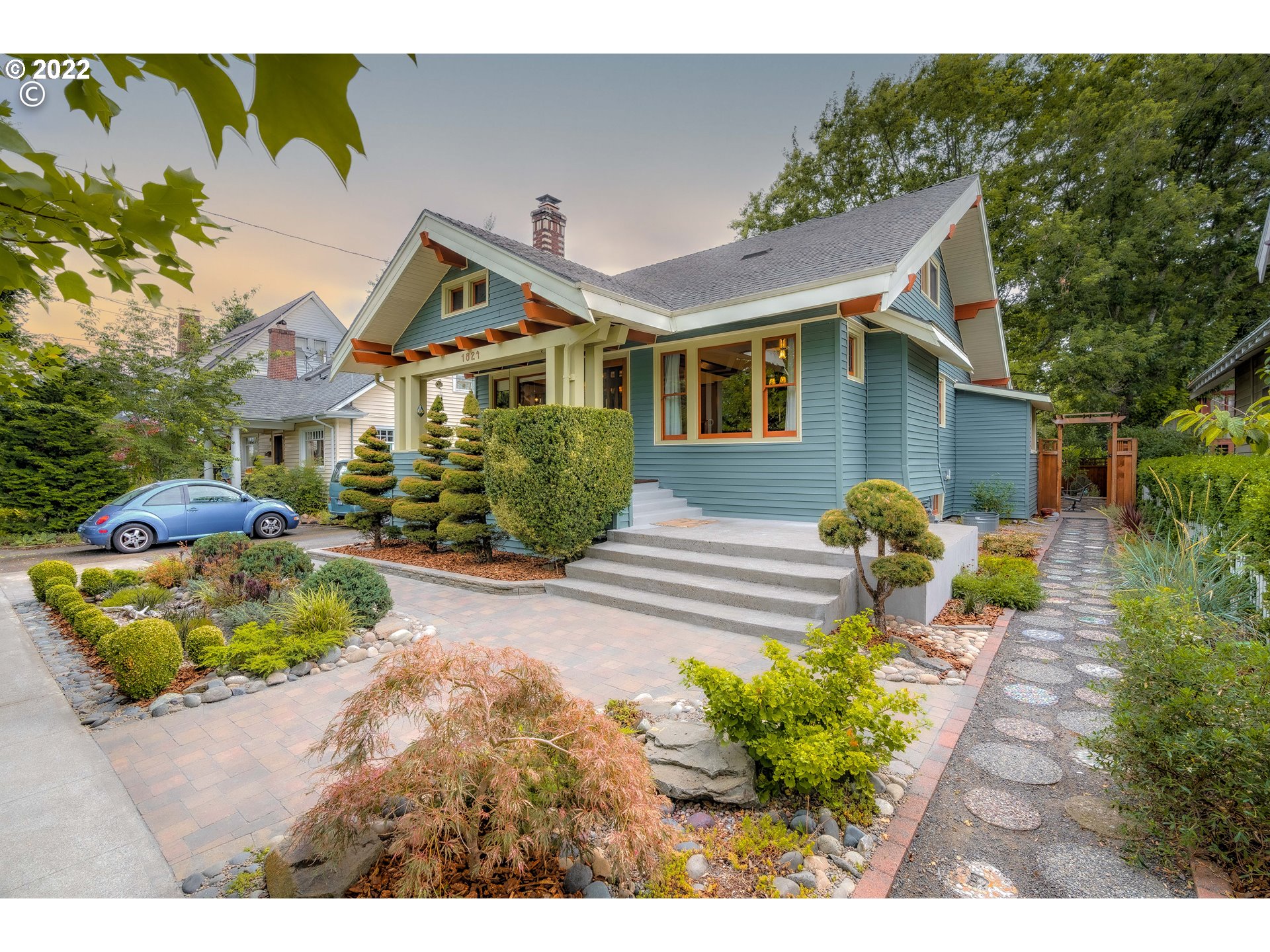 1824 Northeast 53rd Avenue Portland, OR 97213 - Photo 2 of 32 a front view of a house with a yard and outdoor seating