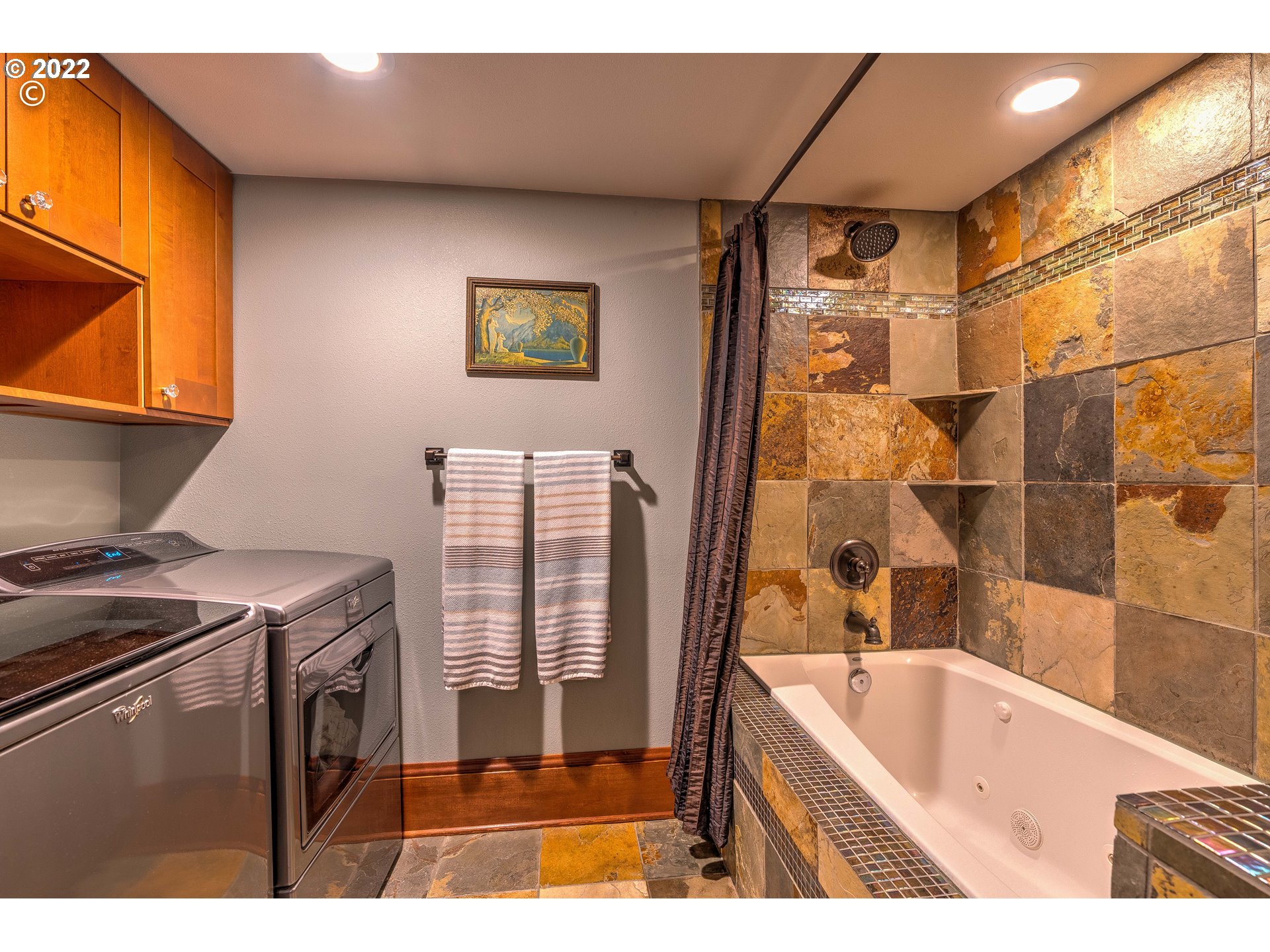 1824 Northeast 53rd Avenue Portland, OR 97213 - Photo 23 of 32 a bathroom with a tub sink and mirror