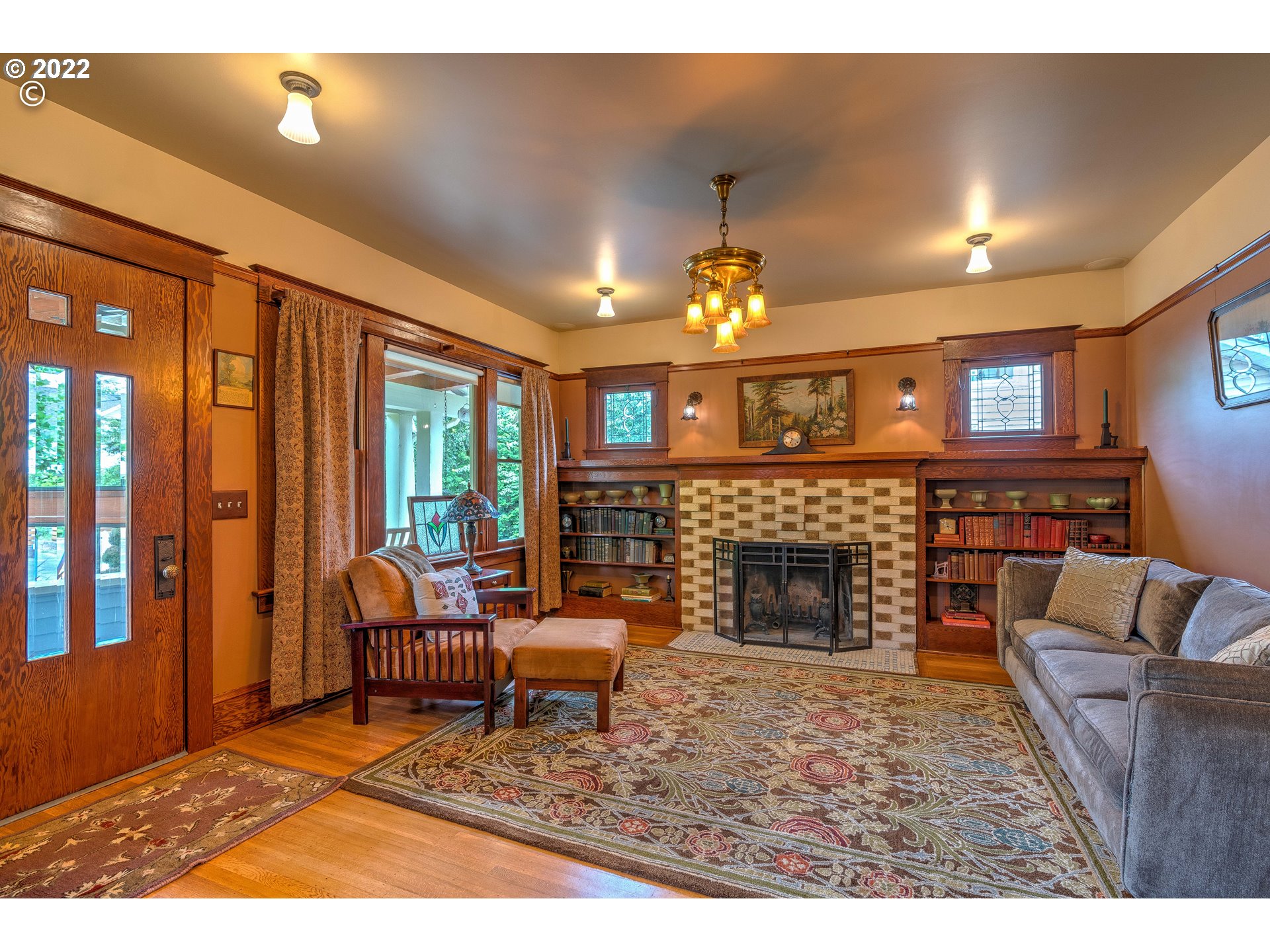 1824 Northeast 53rd Avenue Portland, OR 97213 - Photo 4 of 32 a living room with furniture and a fireplace
