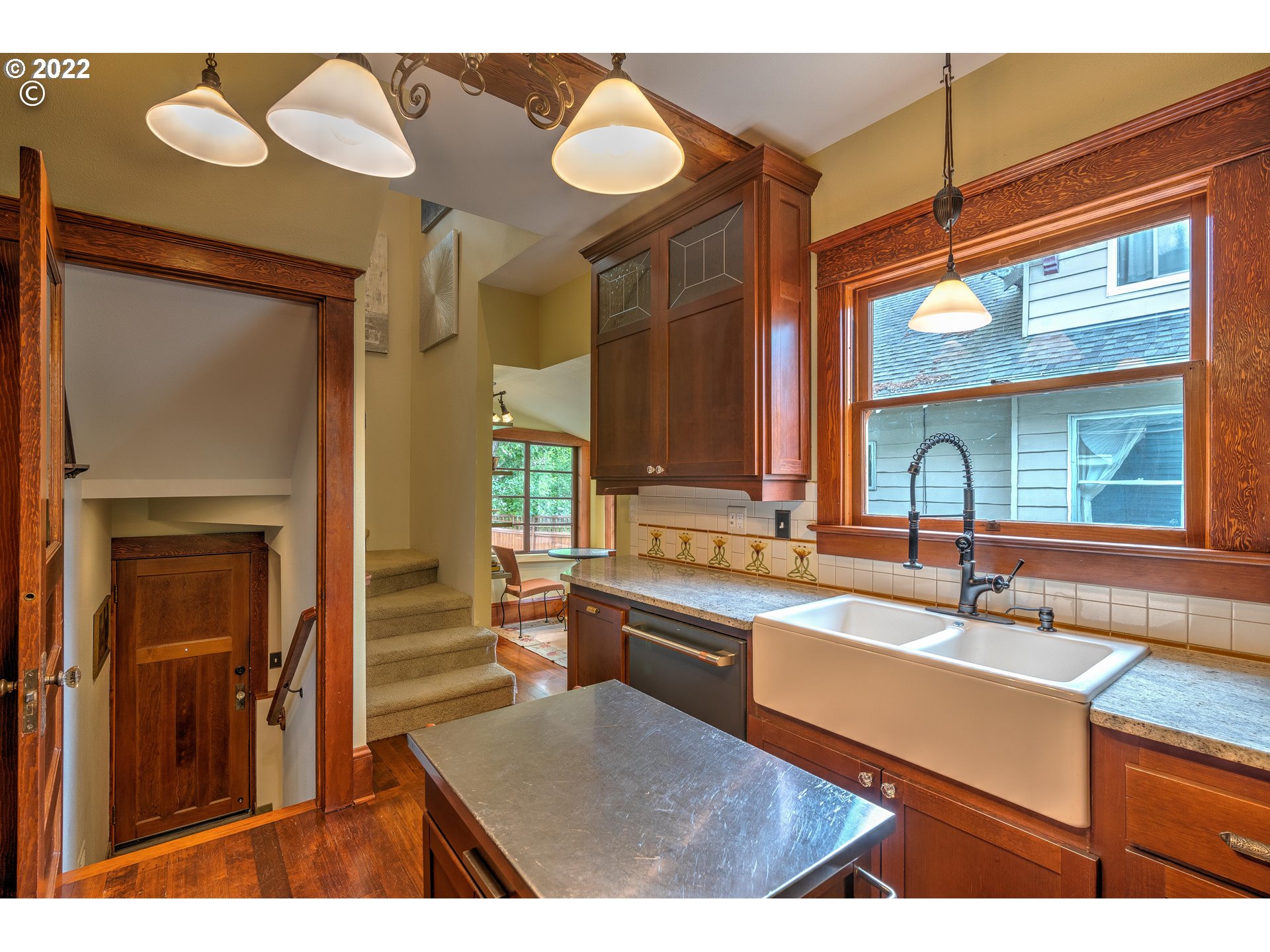 1824 Northeast 53rd Avenue Portland, OR 97213 - Photo 9 of 32 a kitchen with a sink cabinets and window