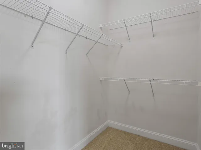a view of a chairs on wooden deck