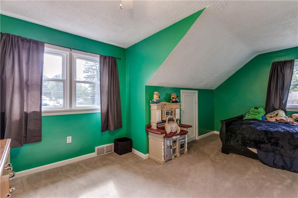 1664 Brodhead Road Coraopolis, PA 15108 - Photo 21 of 25 Bedroom # 3 upstairs with closet and storage space! Nice sized rooms!