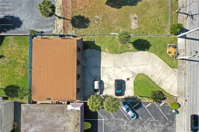an aerial view of a city with ocean view