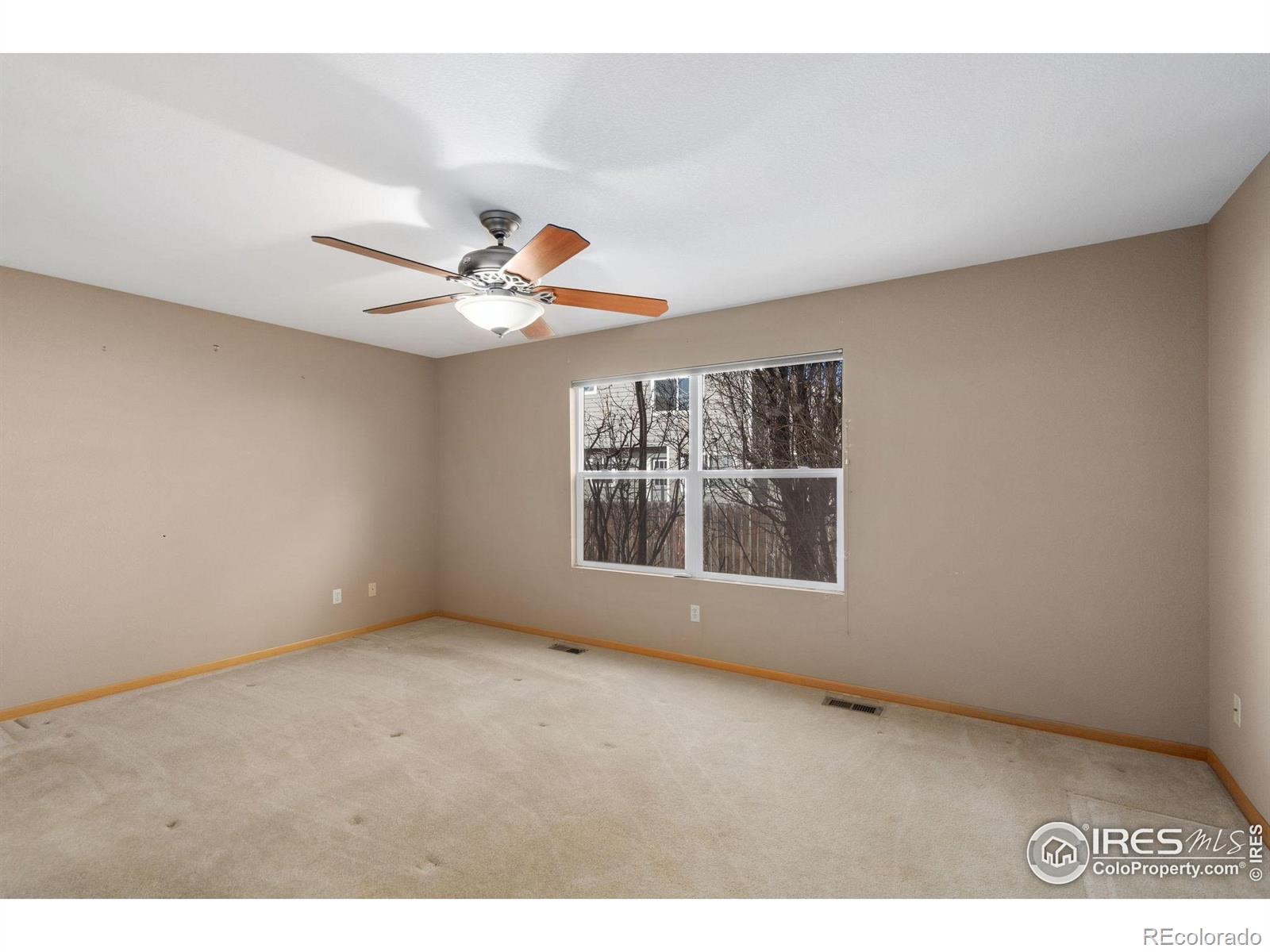 2656 Paddington Road Fort Collins, CO 80525 - Photo 20 of 50 a view of an empty room with a window