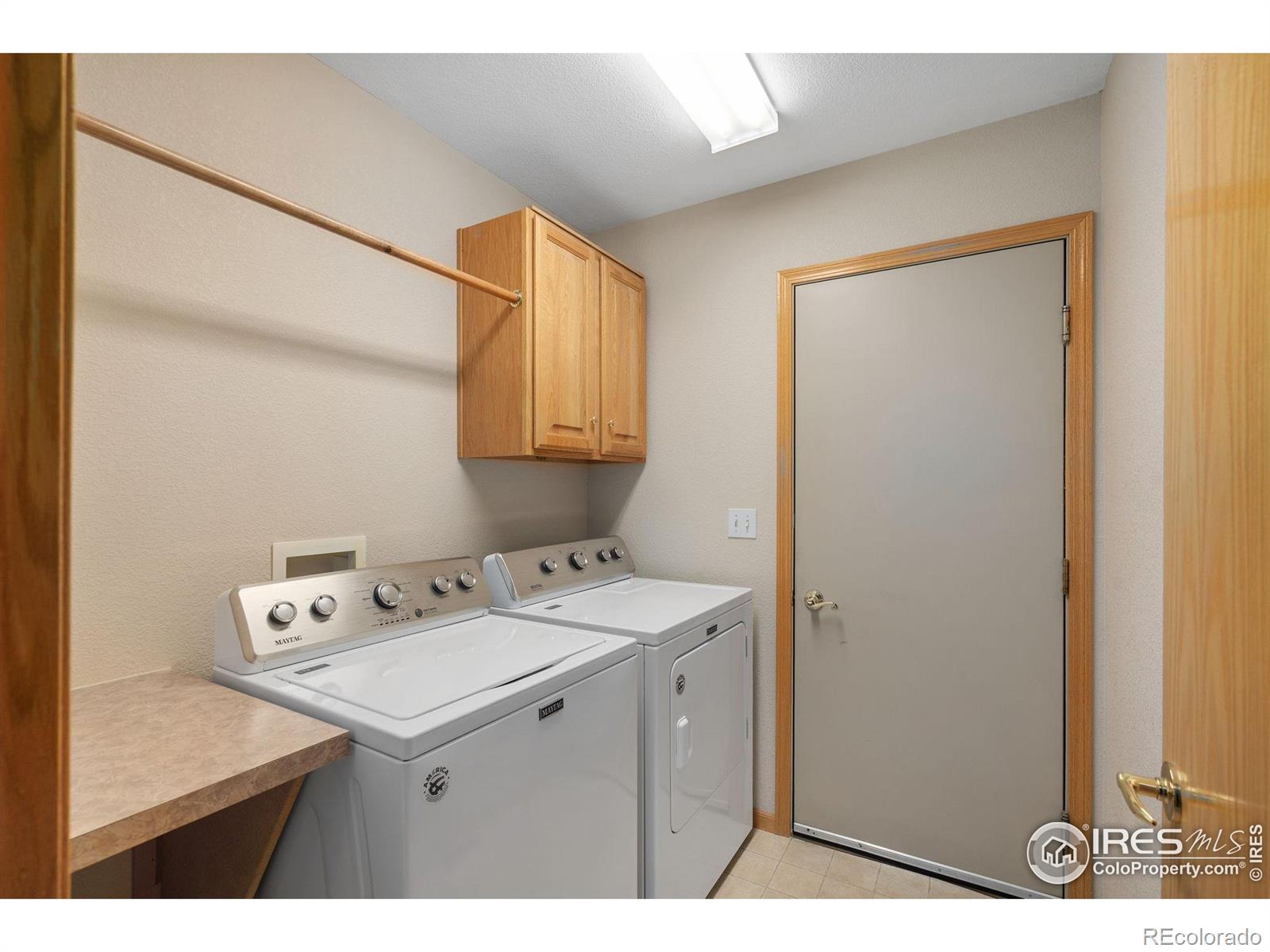2656 Paddington Road Fort Collins, CO 80525 - Photo 29 of 50 a bathroom with a sink and a mirror