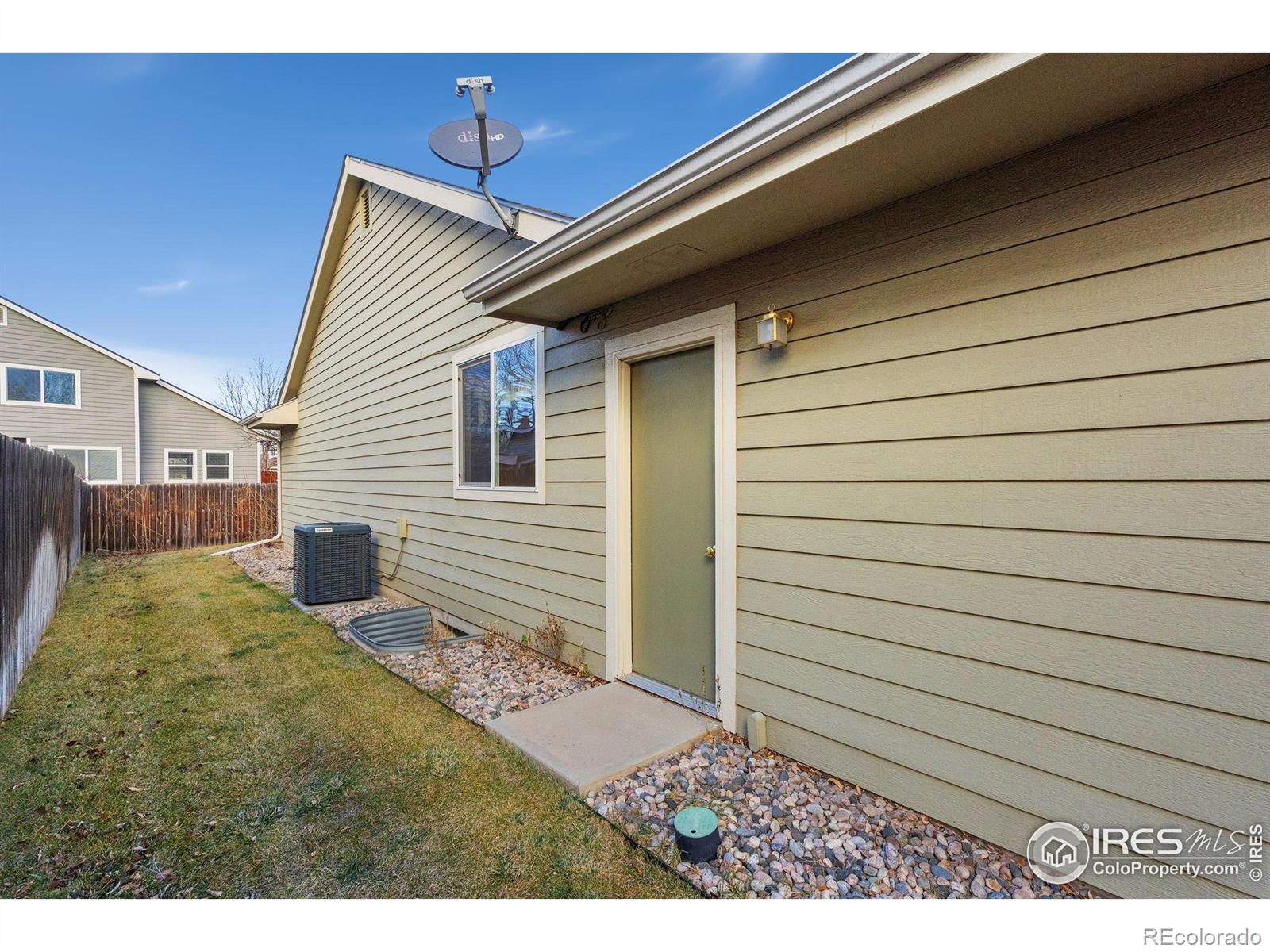 2656 Paddington Road Fort Collins, CO 80525 - Photo 45 of 50 a view of a house with a backyard