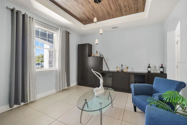 a living room with furniture and a table