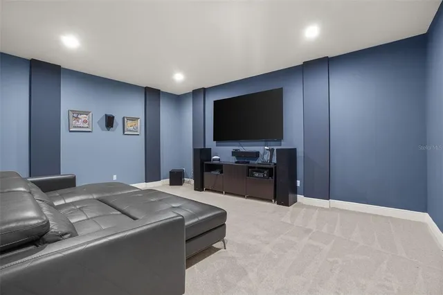 a bedroom with a bed and a potted plant