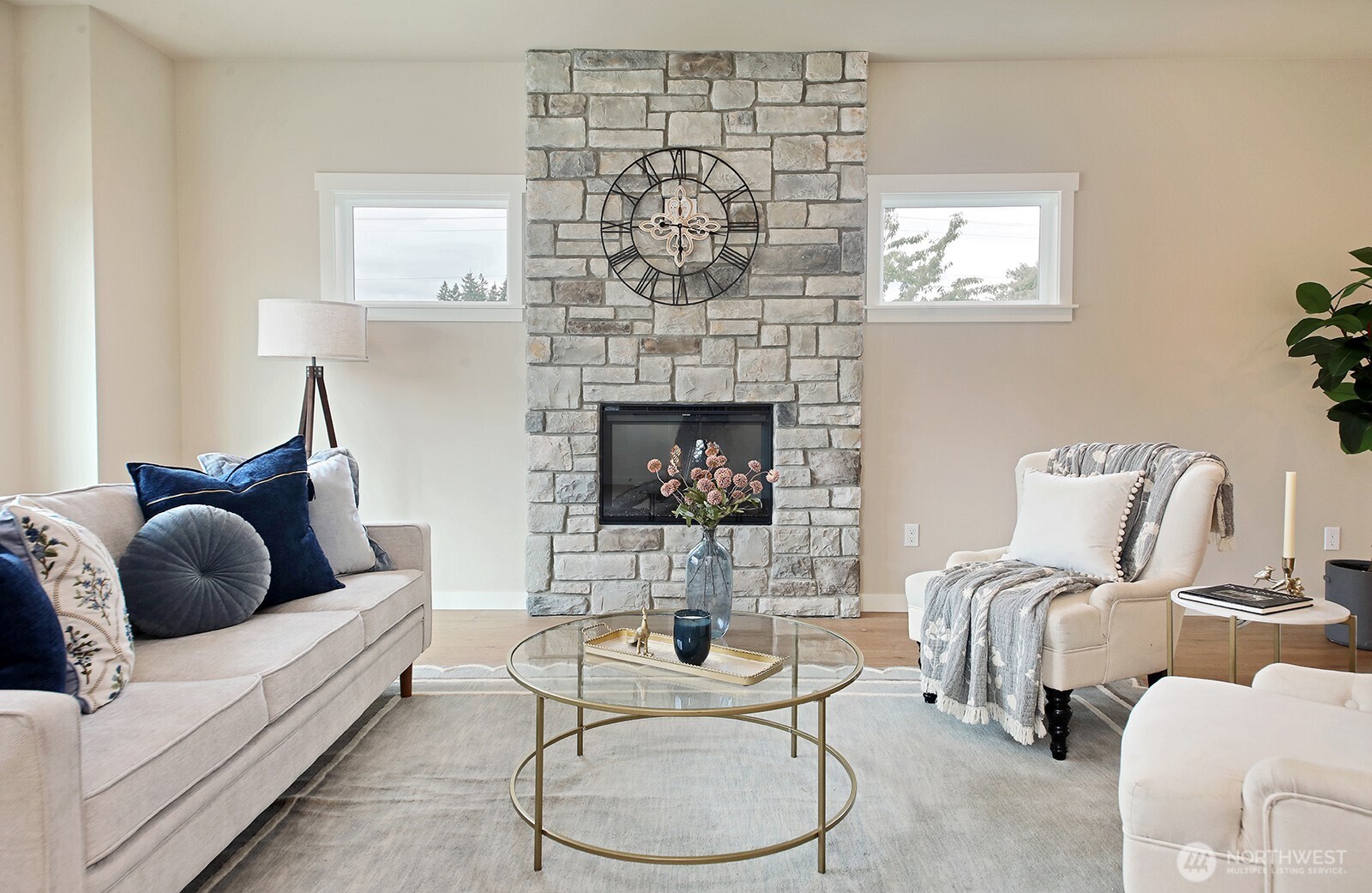 695 3rd Street, Unit A Langley, WA 98260 - Photo 3 of 28 a living room with furniture and a fireplace