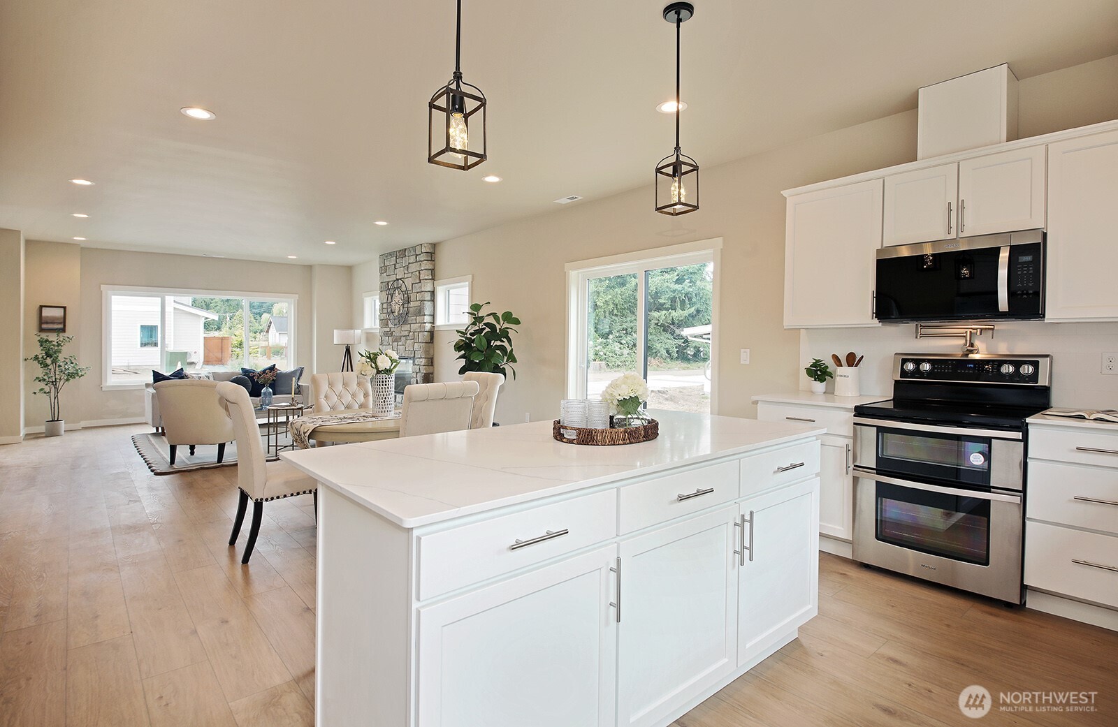 695 3rd Street, Unit A Langley, WA 98260 - Photo 10 of 28 a kitchen with sink stove and refrigerator