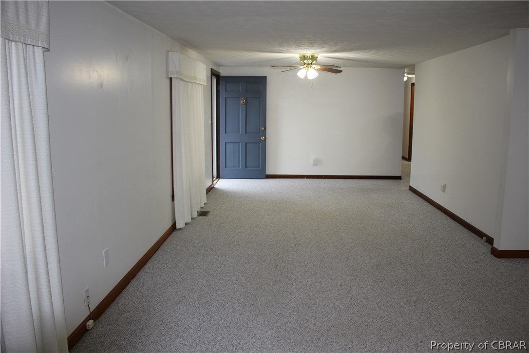 1174 North River Road Bohannon, VA 23021 - Photo 6 of 35 a view of a room with a hallway
