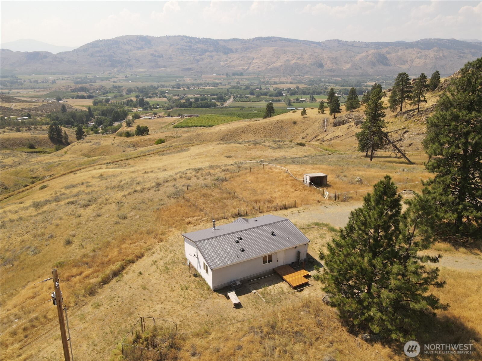 105 Swanson Mill Road Oroville, WA 98844 - Photo 7 of 37 a view of an ocean and mountain