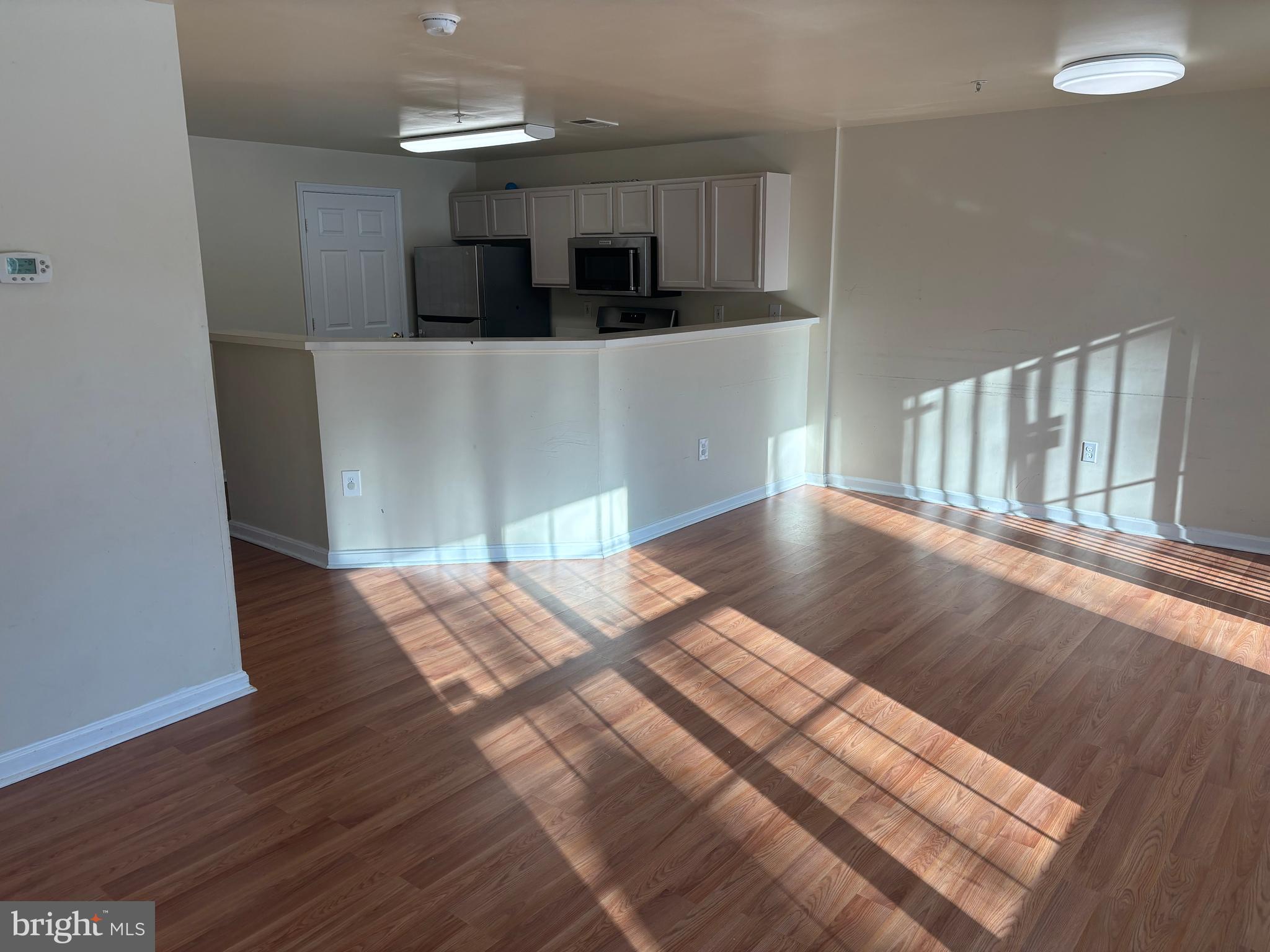13315 Rushing Water Way, Unit 4 Germantown, MD 20874 - Photo 2 of 10 View from Living Room towards Kitchen