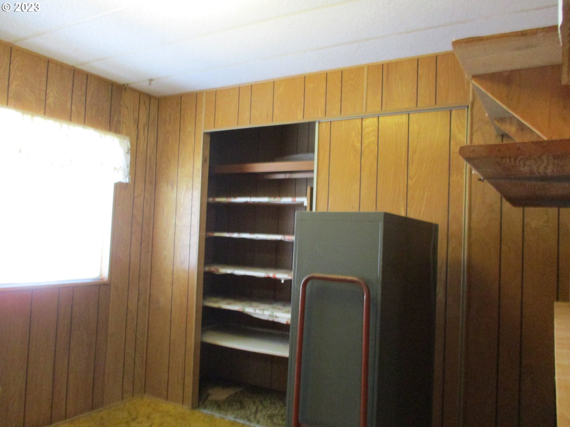 3387 Rainbow Loop Hubbard, OR 97032 - Photo 14 of 19 a view of walk in closet with window