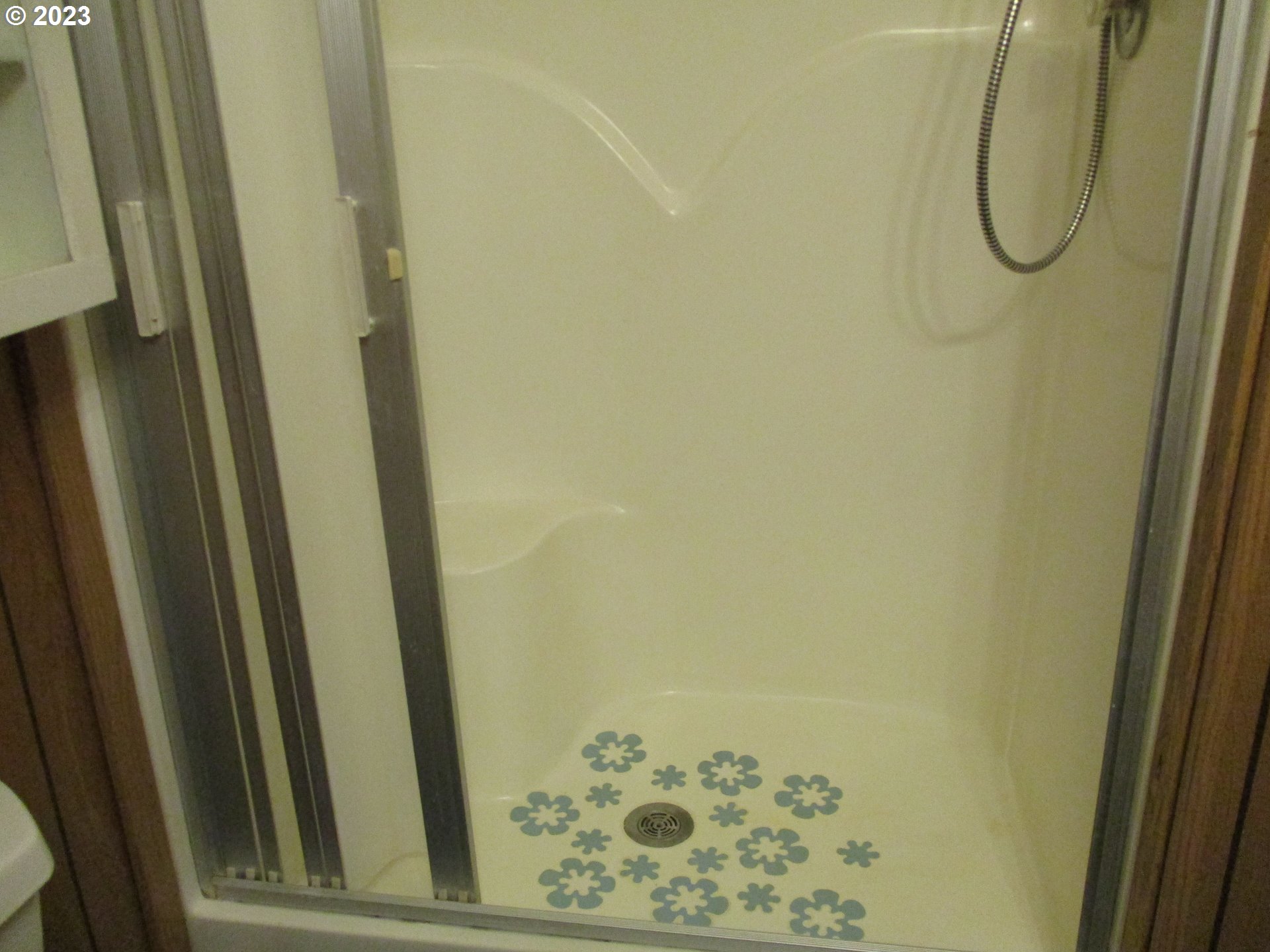 3387 Rainbow Loop Hubbard, OR 97032 - Photo 16 of 19 a bathroom with a shower and a sink