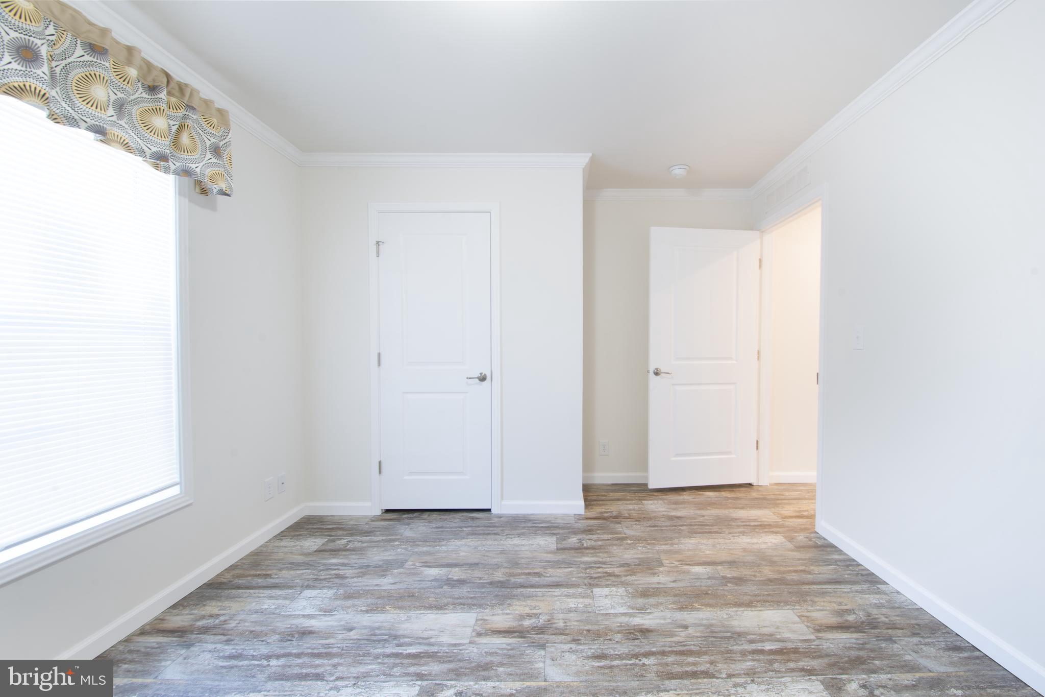 54 Sherwood Forest Way, Unit 54 Hartly, DE 19953 - Photo 12 of 12 a view of an empty room