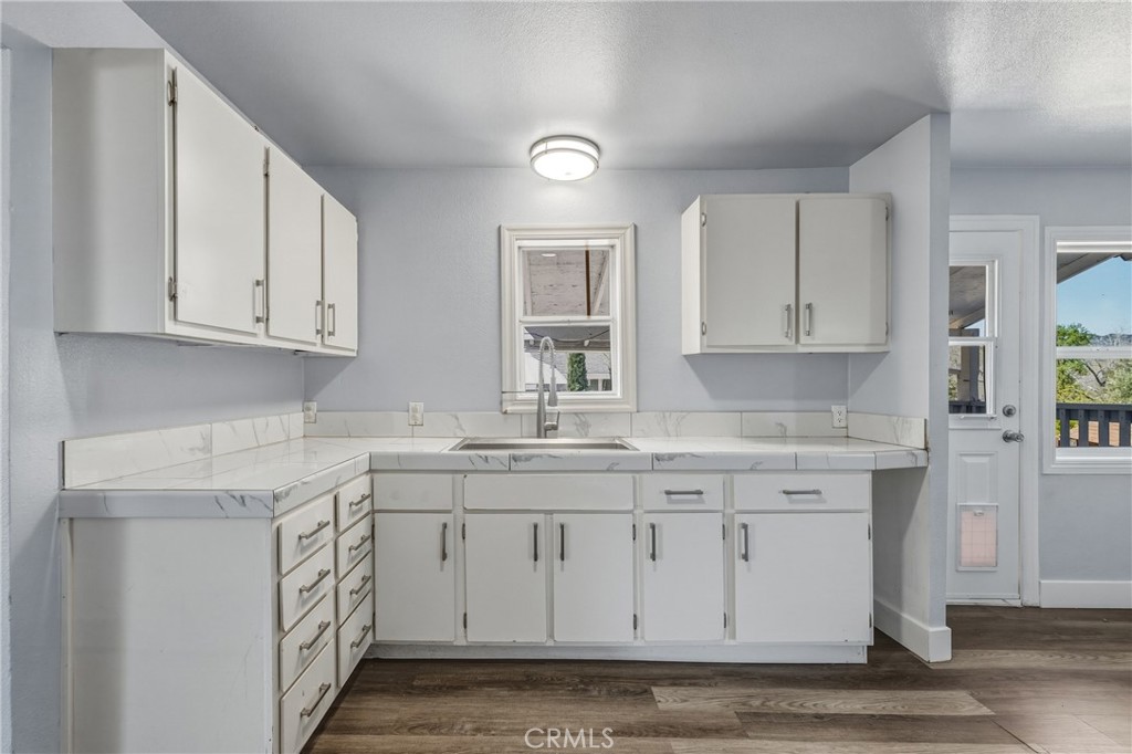 4629 Hill Road Lakeport, CA 95453 - Photo 18 of 69 a kitchen with a sink cabinets and window