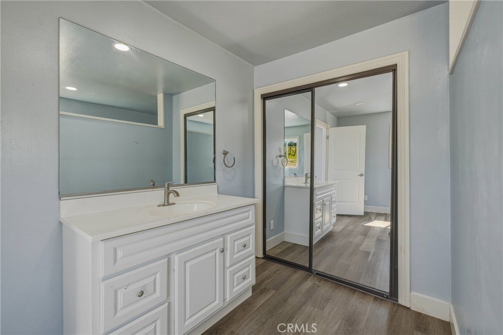 4629 Hill Road Lakeport, CA 95453 - Photo 32 of 69 a bathroom with a sink and a mirror