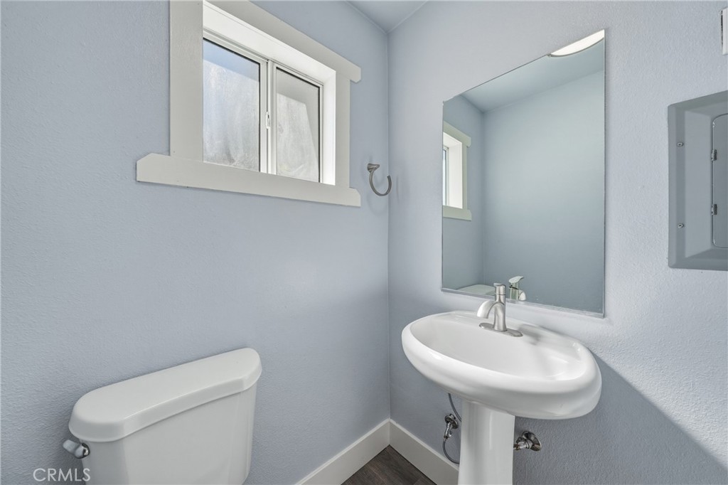 4629 Hill Road Lakeport, CA 95453 - Photo 34 of 69 a bathroom with a sink a toilet and a mirror