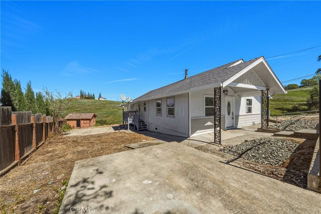 4629 Hill Road Lakeport, CA 95453 - Photo 4 of 69 a view of a house with backyard and sitting area
