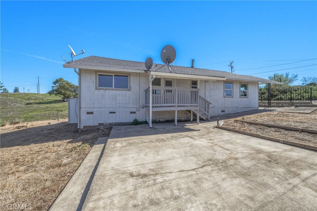 4629 Hill Road Lakeport, CA 95453 - Photo 5 of 69 a front view of a house with a yard