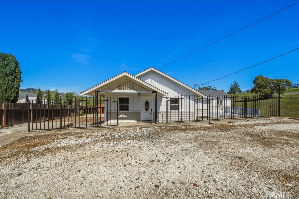 4629 Hill Road Lakeport, CA 95453 - Photo 6 of 69 a front view of a house with a yard