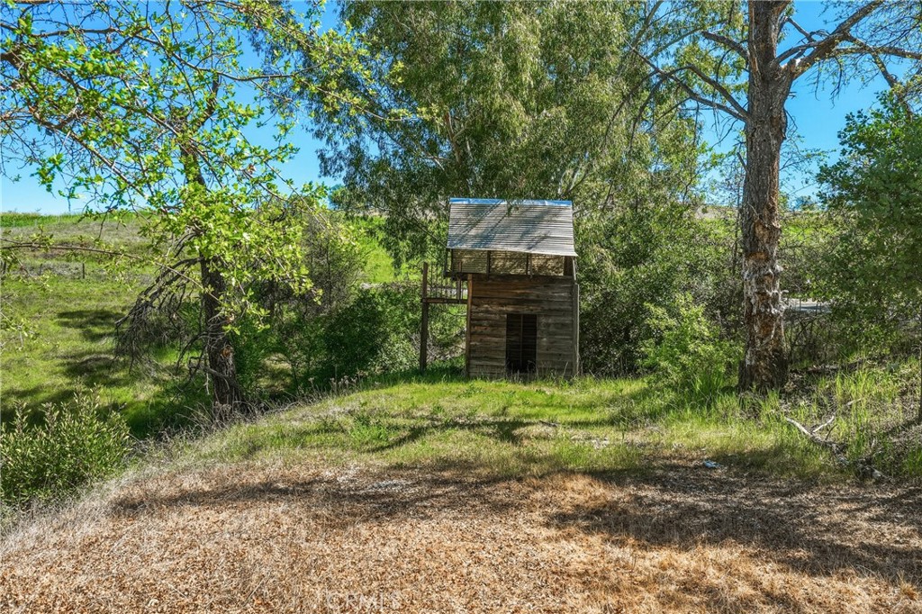4629 Hill Road Lakeport, CA 95453 - Photo 67 of 69 a backyard of a house with a yard and outdoor seating