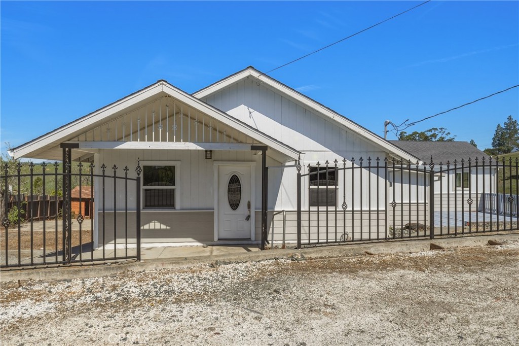 4629 Hill Road Lakeport, CA 95453 - Photo 7 of 69 a front view of a house with a yard