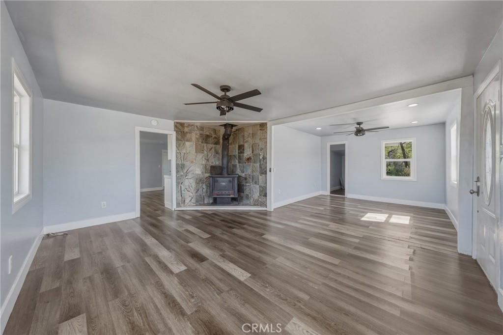 4629 Hill Road Lakeport, CA 95453 - Photo 9 of 69 a view of empty room with wooden floor and window