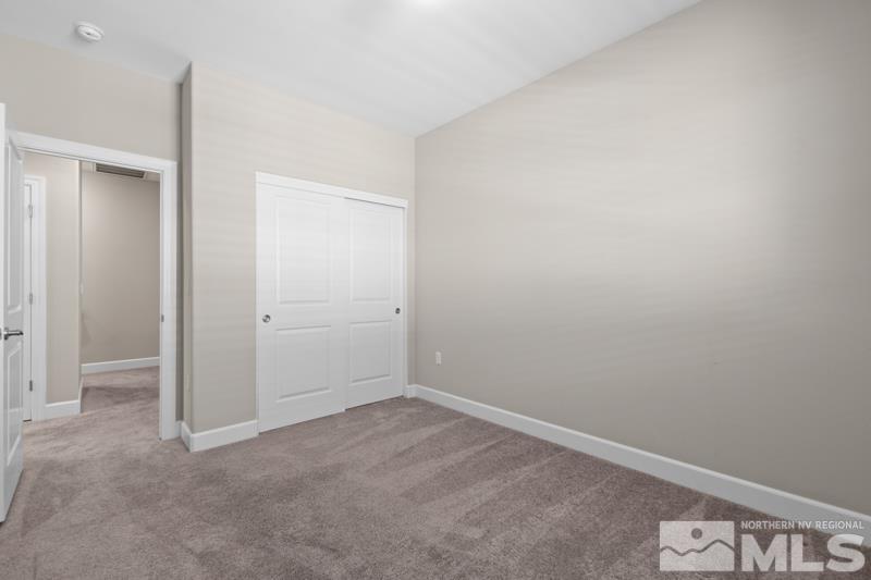 1900 Dark Horse Road, Unit B Reno, NV 89521 - Photo 18 of 34 a view of an empty room