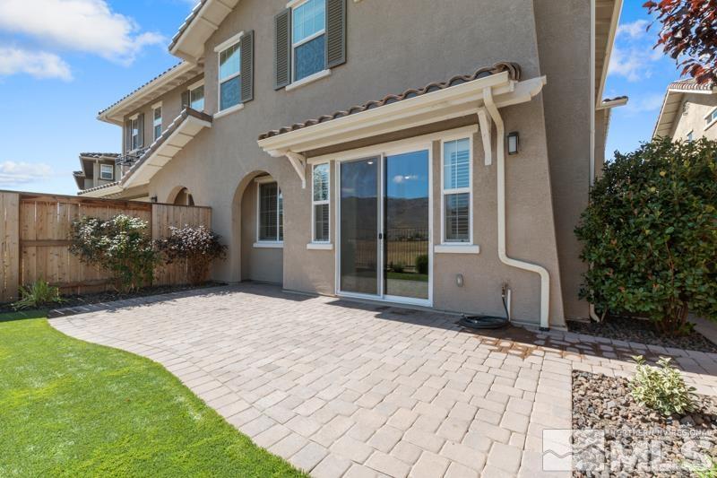 1900 Dark Horse Road, Unit B Reno, NV 89521 - Photo 21 of 34 a view of a house with a yard