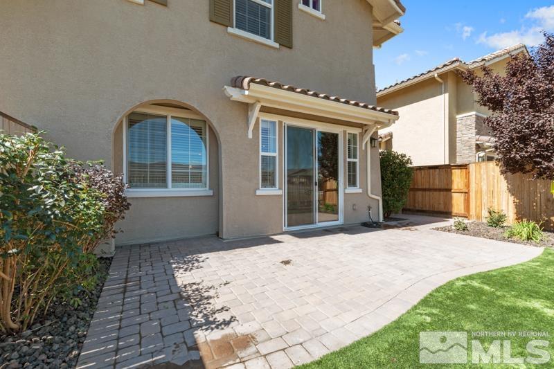 1900 Dark Horse Road, Unit B Reno, NV 89521 - Photo 23 of 34 a front view of a house with a yard