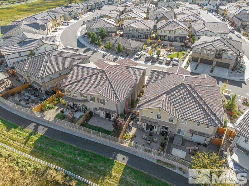 1900 Dark Horse Road, Unit B Reno, NV 89521 - Photo 26 of 34 a view of a roof deck with couches and wooden floor