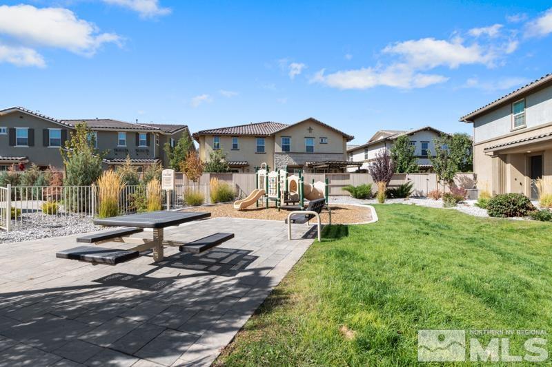 1900 Dark Horse Road, Unit B Reno, NV 89521 - Photo 29 of 34 a front view of a house with garden