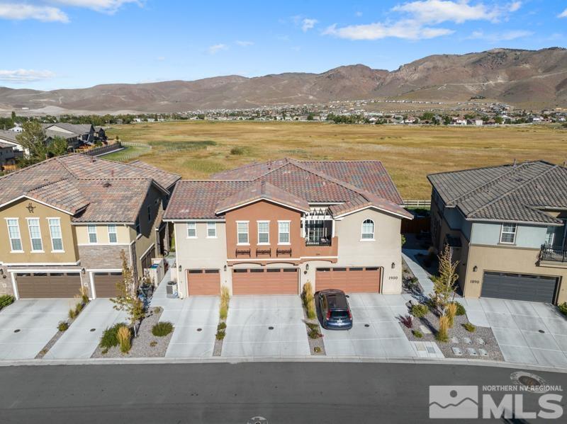 1900 Dark Horse Road, Unit B Reno, NV 89521 - Photo 4 of 34 an aerial view of residential houses with outdoor space and ocean view