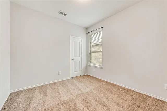 a bathroom with a sink a toilet a mirror and a bathtub