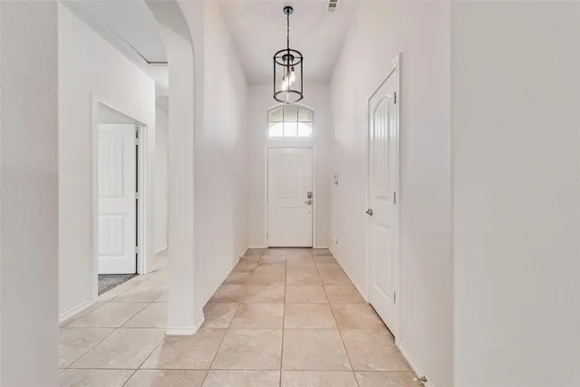 a view of a kitchen with electric appliances